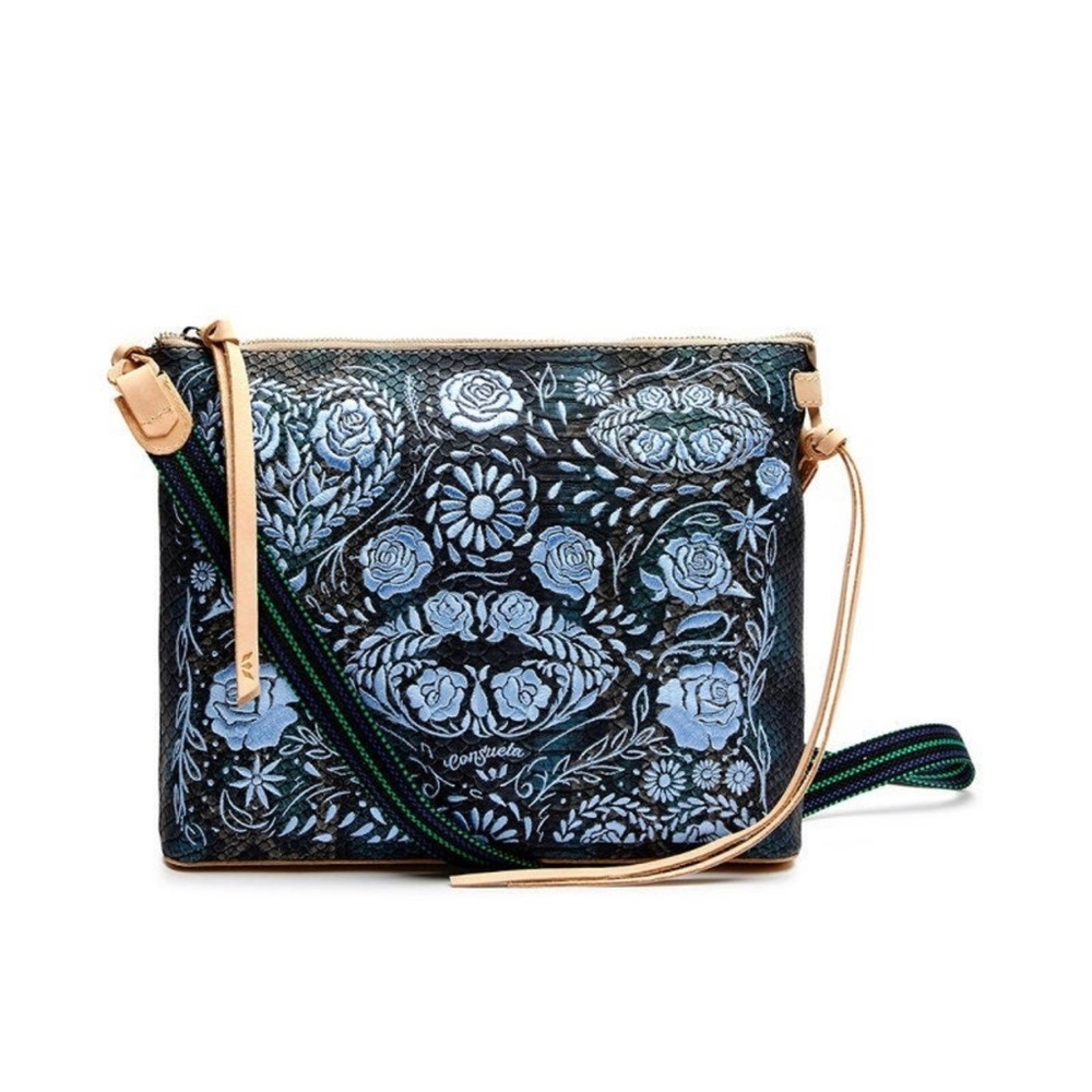 Rattler embossed snake print exterior
-Light blue floral embroidery